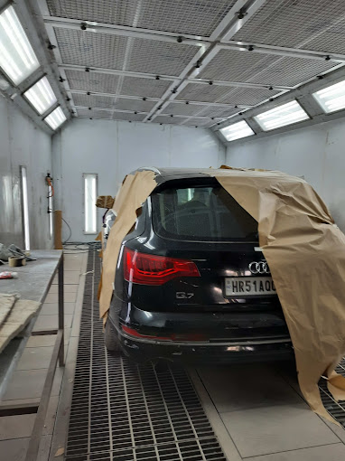 audi car in workshop with cover at xl car care