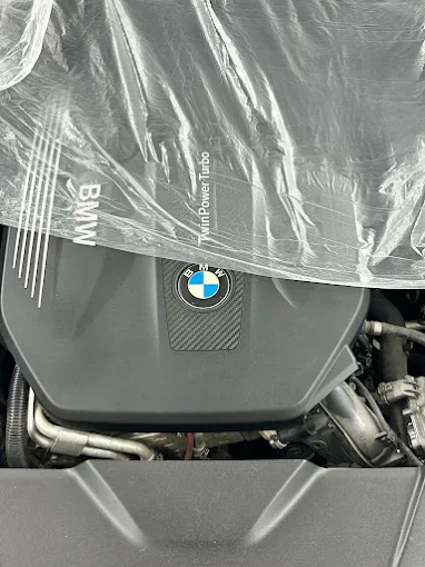 BMW engine under inspection showing TwinPower Turbo system